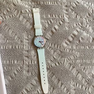 NWT Swatch Swiss watch, light blue-iridescent
